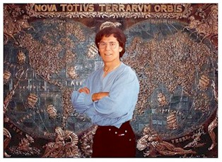 Artist Andreas Mujica in front of his copper mural Terrarvm Orbis